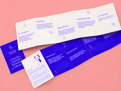Folded paper with text on a pink background