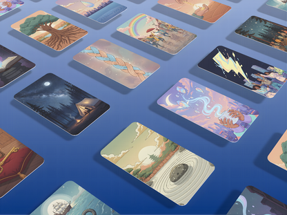 Collection of illustrated cards on a blue surface